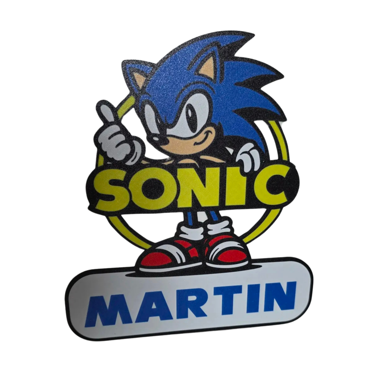 Aplique decorativo de Sonic the Hedgehog con el nombre "MARTIN" en la placa inferior, mostrando al personaje azul con pulgar arriba y logo "SONIC".
