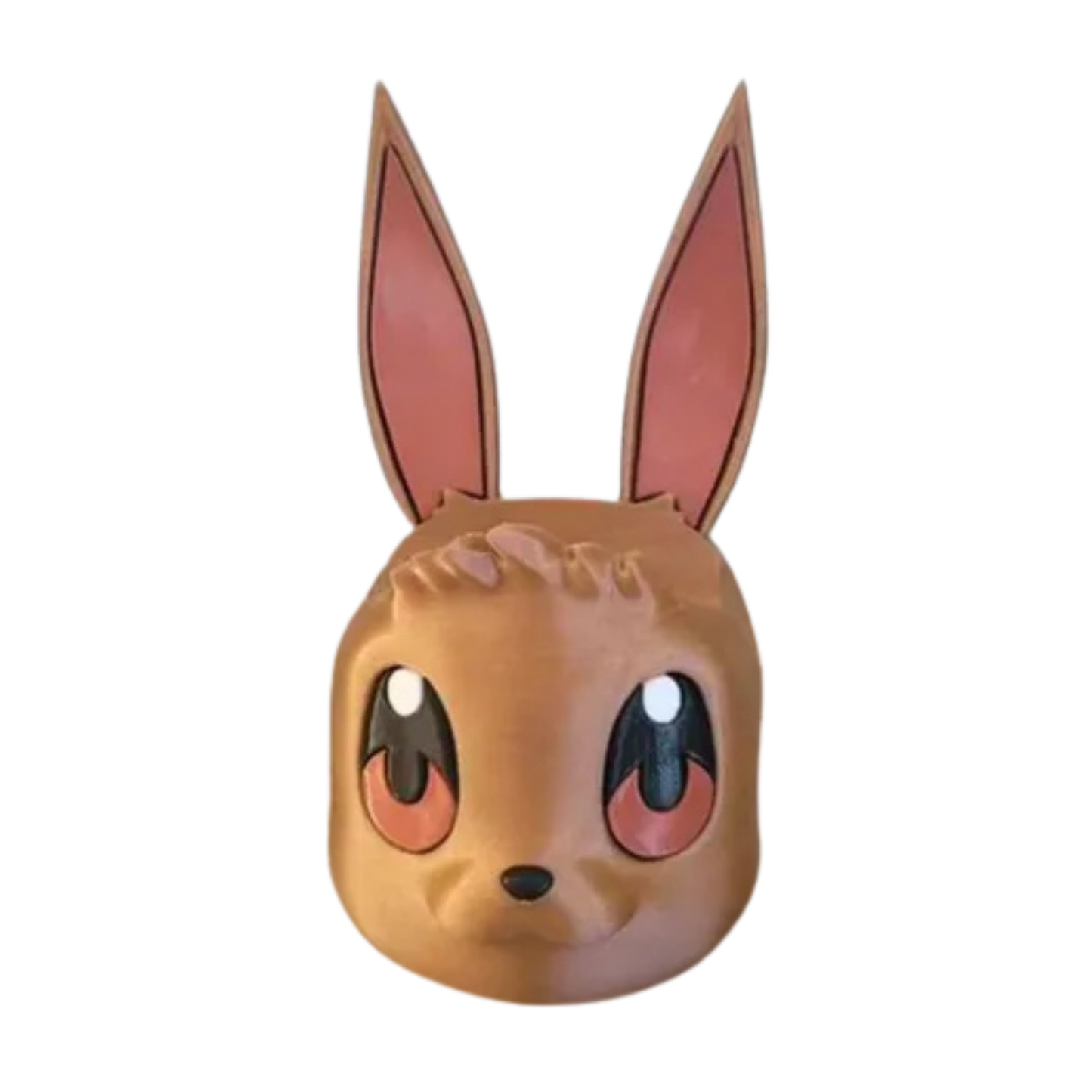 Figura decorativa de la cabeza de Eevee (Pokémon) en color marrón claro, vista frontal, con sus grandes ojos y orejas levantadas.