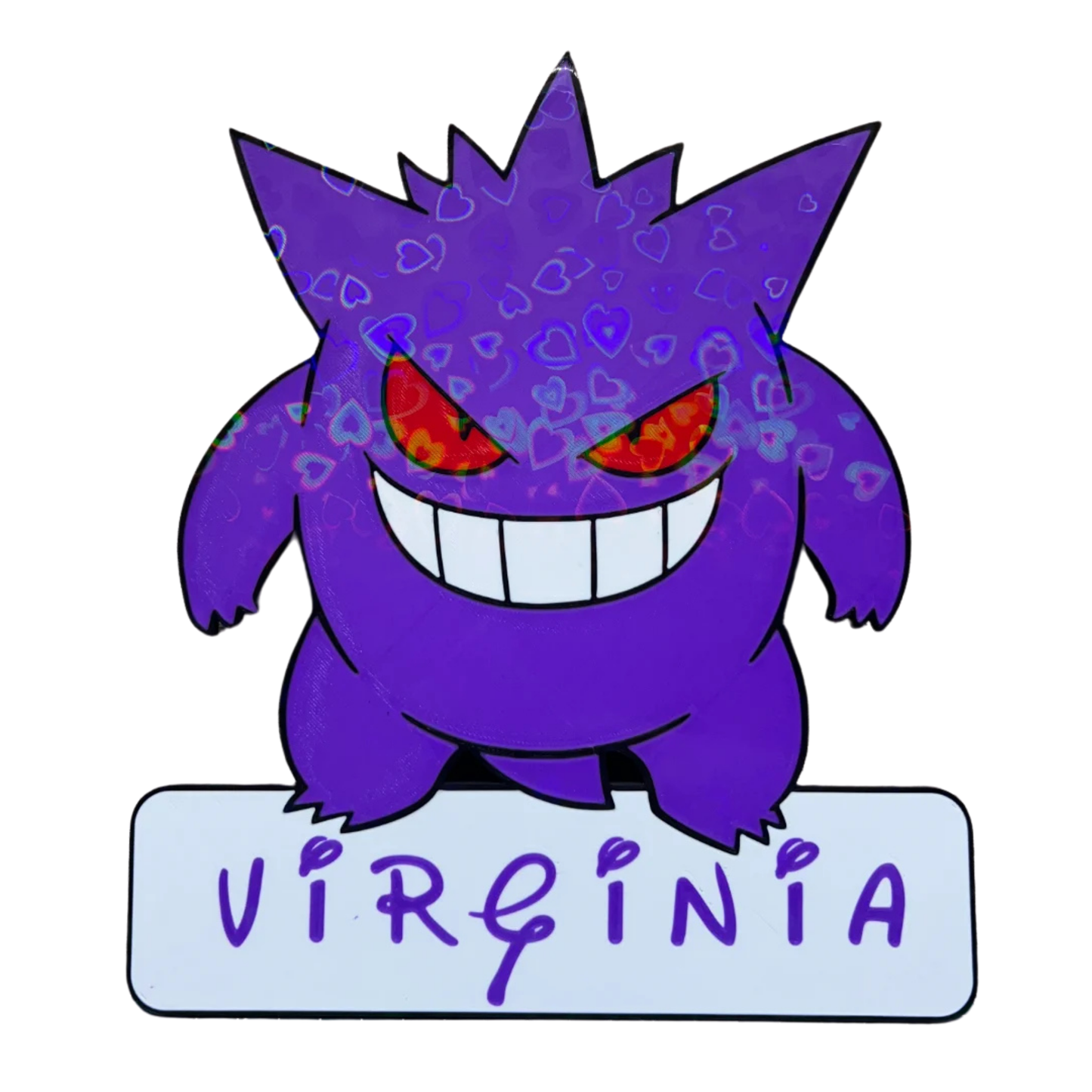 Figura decorativa de Gengar Pokémon con ojos rojos brillantes y una sonrisa, con el nombre "VIRGINIA" en la base, ideal para coleccionistas.
