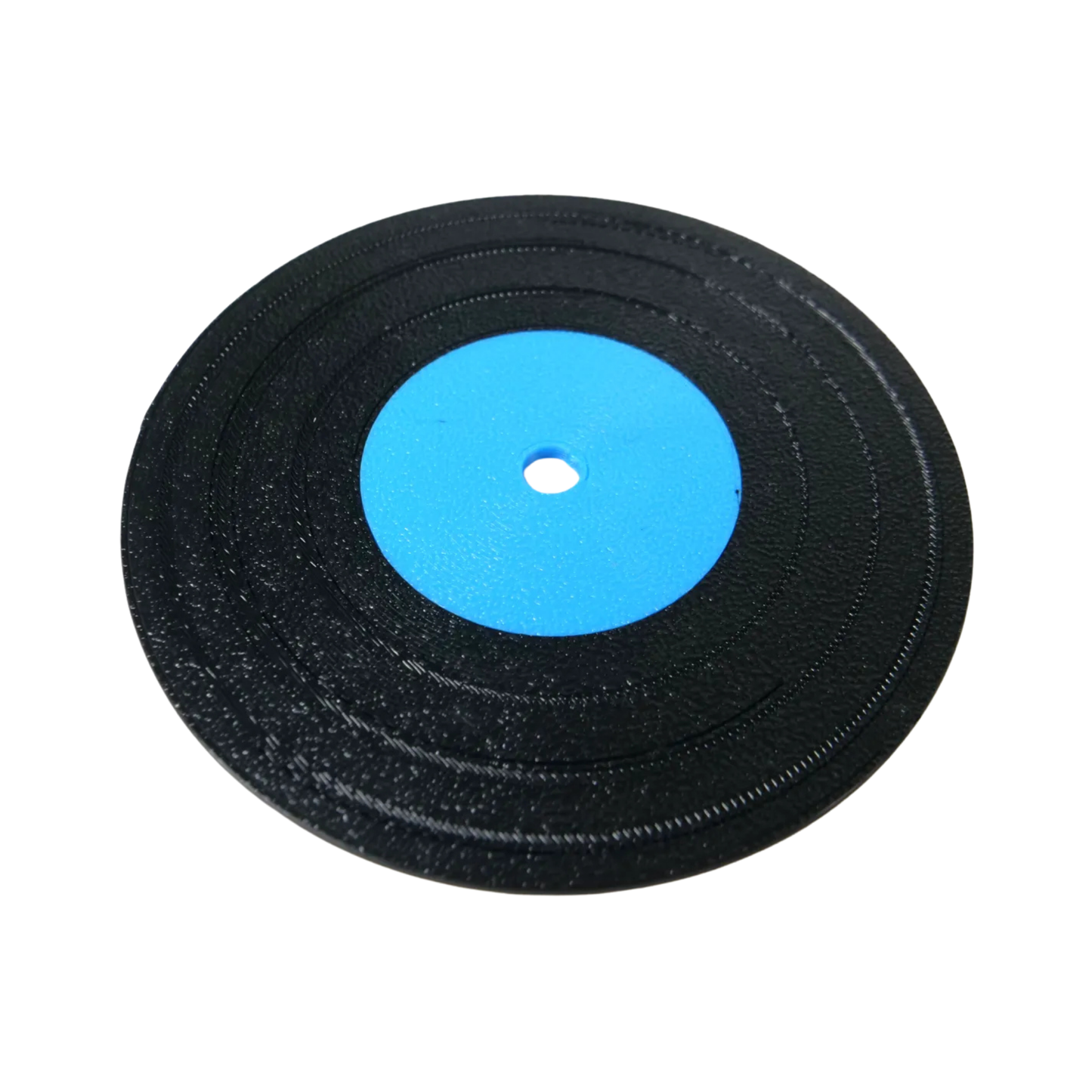 Un solo posavasos redondo con diseño de disco de vinilo negro y etiqueta central de color azul brillante.